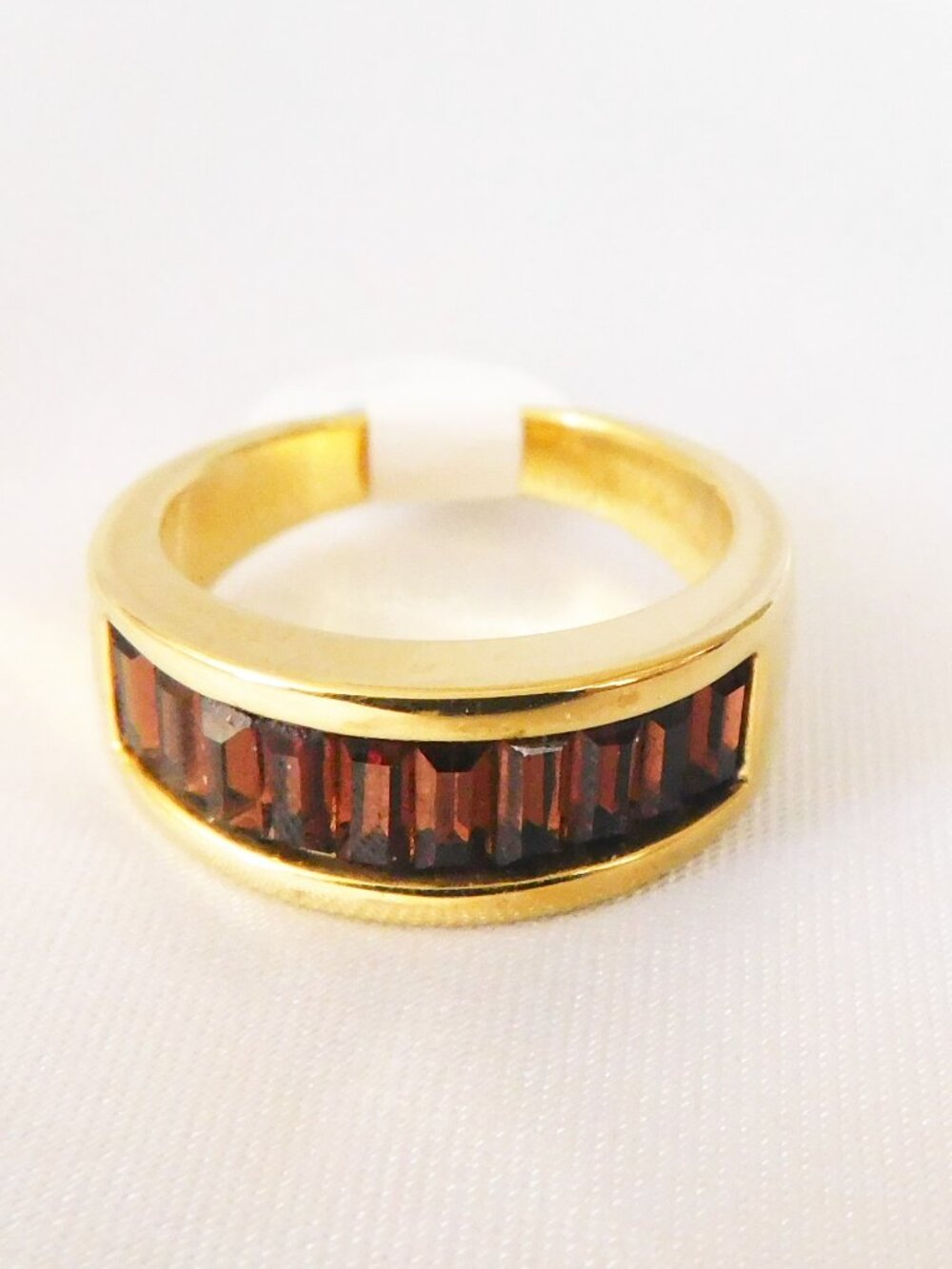 Nolan Miller Gold Tone Size 6 Ring with Channel Set Amethyst Stones